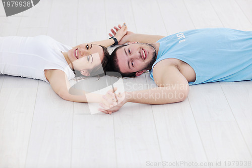 Image of happy young couple fitness workout and fun