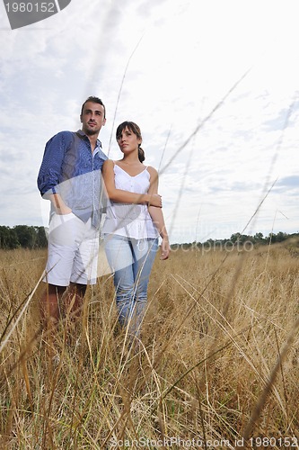 Image of happy young couple have romantic time outdoor