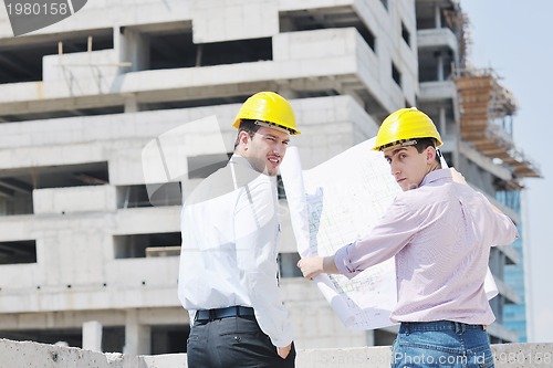 Image of Team of architects on construciton site