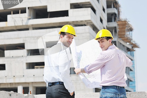 Image of Team of architects on construciton site