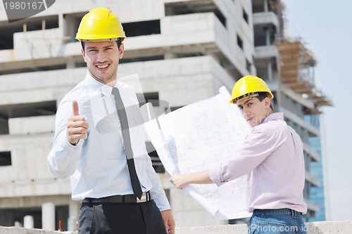 Image of Team of architects on construciton site