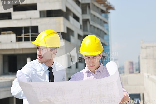 Image of Team of architects on construciton site