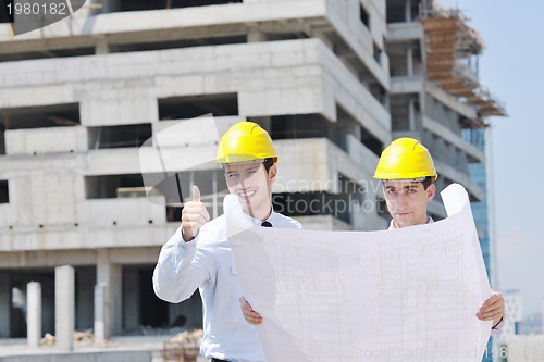 Image of Team of architects on construciton site