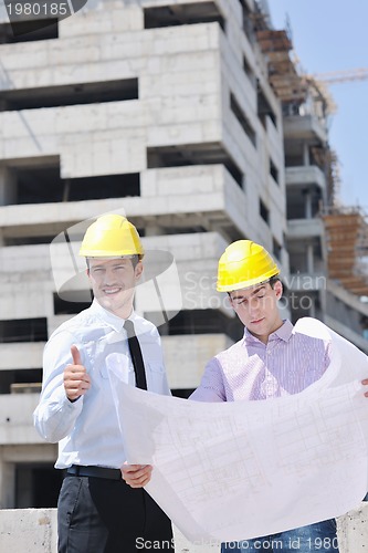 Image of Team of architects on construciton site