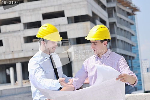 Image of Team of architects on construciton site