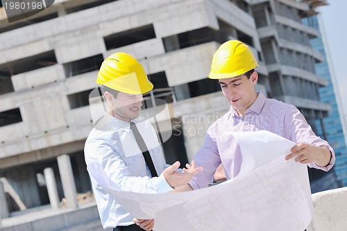 Image of Team of architects on construciton site