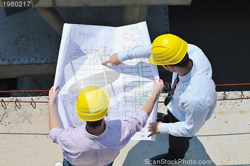 Image of Team of architects on construciton site