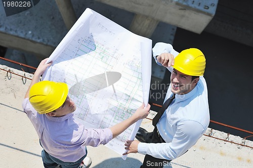 Image of Team of architects on construciton site