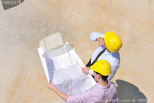 Image of Team of architects on construciton site