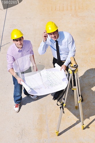 Image of Team of architects on construciton site