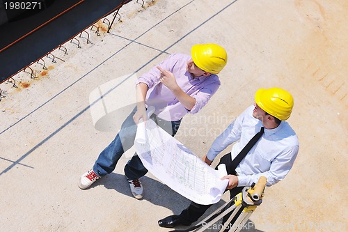 Image of Team of architects on construciton site