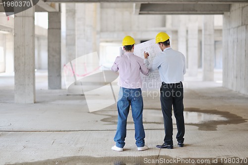 Image of Team of architects on construciton site