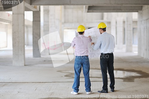 Image of Team of architects on construciton site