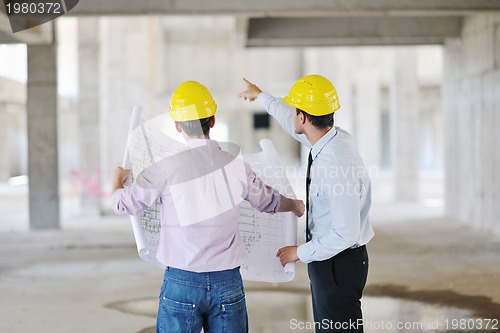 Image of Team of architects on construciton site