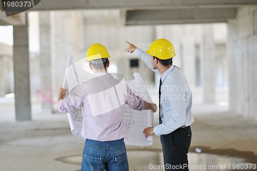 Image of Team of architects on construciton site