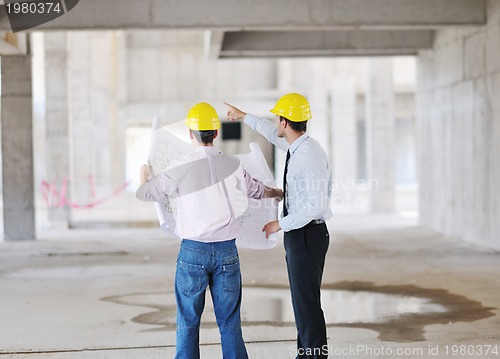 Image of Team of architects on construciton site