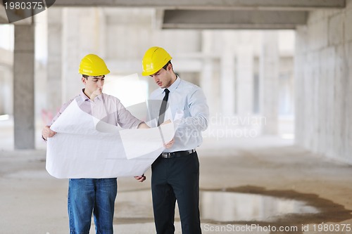 Image of Team of architects on construciton site