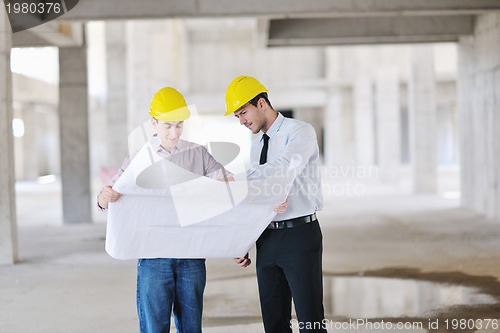 Image of Team of architects on construciton site