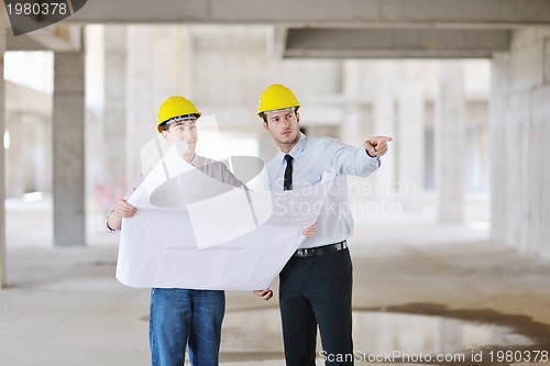 Image of Team of architects on construciton site