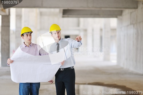 Image of Team of architects on construciton site