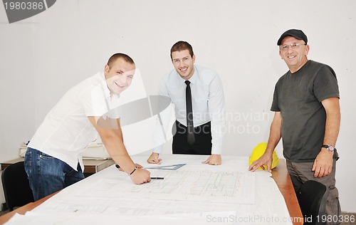 Image of Team of architects on construciton site