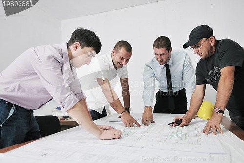 Image of Team of architects on construciton site