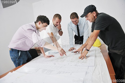 Image of Team of architects on construciton site