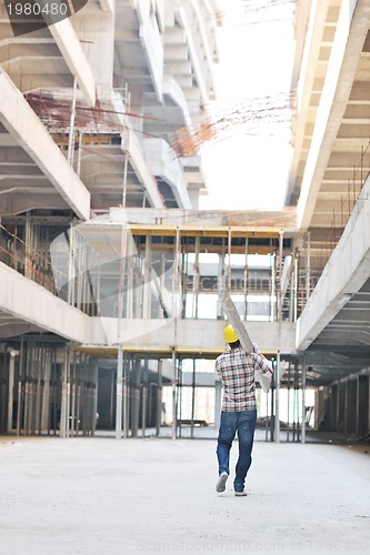 Image of hard worker on construction site