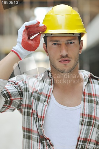 Image of hard worker on construction site