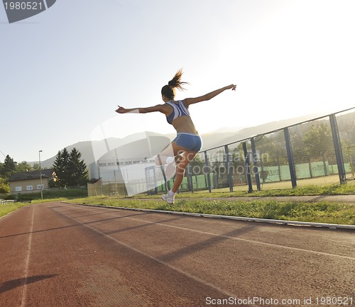 Image of woman jogging at early morning