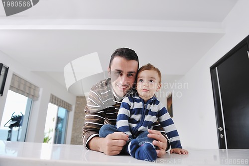 Image of happy young family have fun  at home