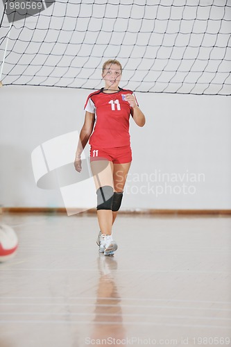 Image of girl playing volleyball game