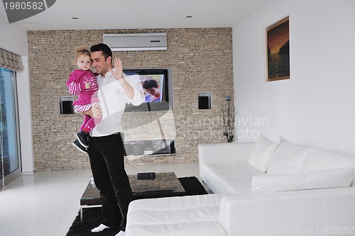 Image of happy young family have fun  at home