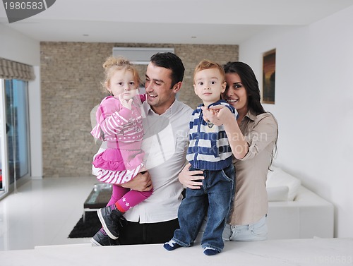 Image of happy young family have fun  at home