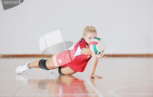 Image of girl playing volleyball game