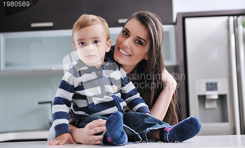 Image of happy mom and son together at home