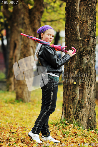 Image of happy girl with umbrella