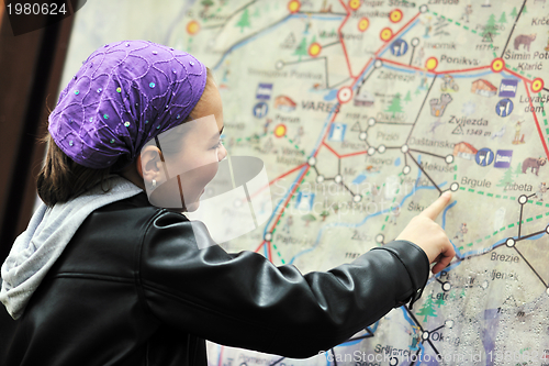 Image of girl with city map panel