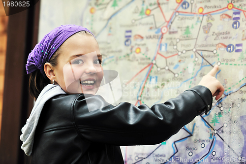 Image of girl with city map panel