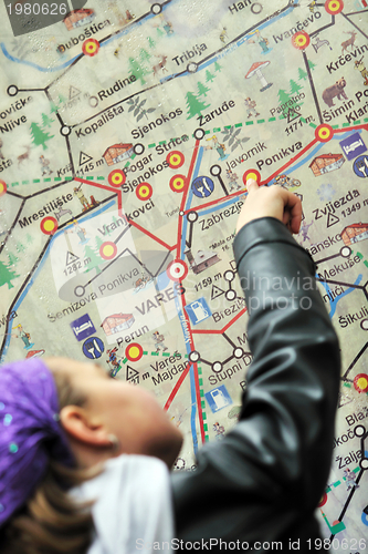 Image of girl with city map panel