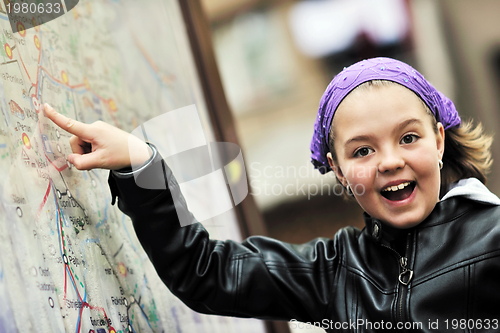 Image of girl with city map panel