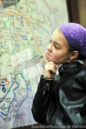 Image of girl with city map panel