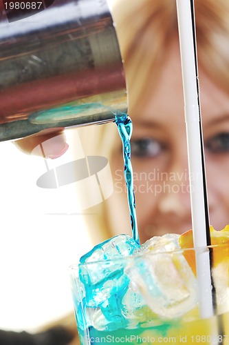 Image of female bartender isolated on white