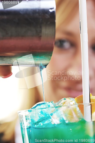 Image of female bartender isolated on white