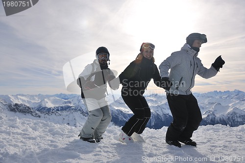 Image of  people group on snow at winter season