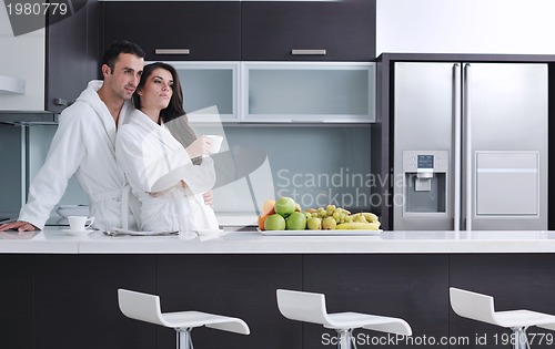 Image of young couple have fun in modern kitchen