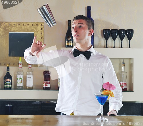 Image of pro barman prepare coctail drink on party