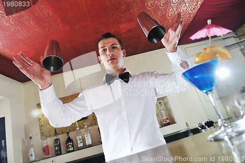 Image of pro barman prepare coctail drink on party