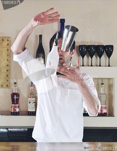 Image of pro barman prepare coctail drink on party