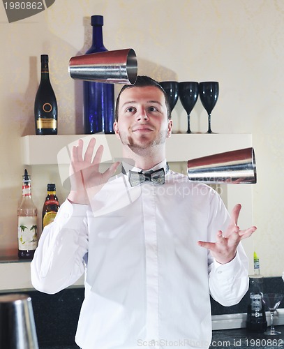 Image of pro barman prepare coctail drink on party